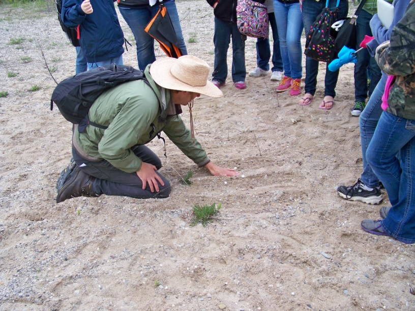 Daniel Moffatt taught students about sand dunes and swales at Thompsons Harbor State Park.