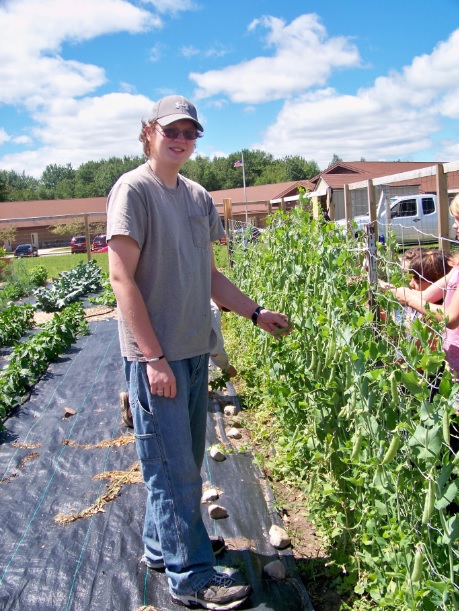 Nick, an Alcona High School senior, is the Alcona Community Garden manager for his Agriscience project � he manages seed production, ordering material and more! 