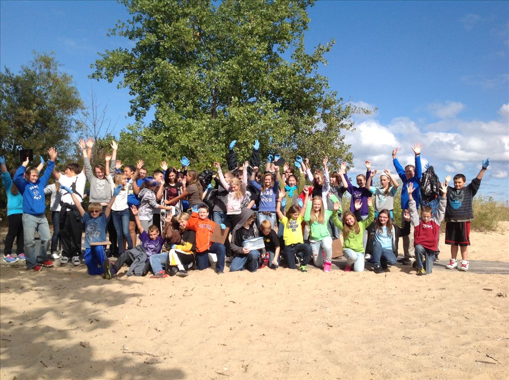 Helping Hands! 7th Grade Students at Oscoda Schools volunteered at AuSable Shoreline Park in Oscoda, MI to conduct an Adopt-a-Beach Clean-up (Sept 2013)