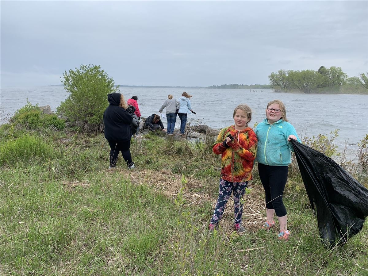 Cleaning the shorelines of Cheboygan River