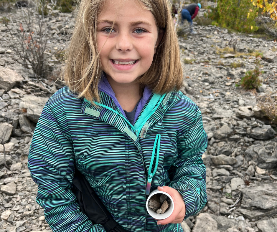 Alcona 3rd Grader Smiles Proudly with Fossil Findings